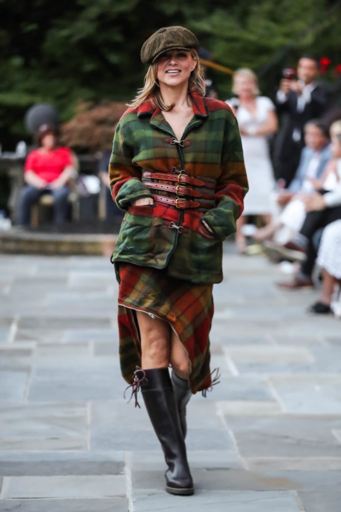 MILL NECK, NEW YORK - JULY 24: A model walks the runway at the Dressed To Kilt Charity Fashion Show at Mill Neck Manor on July 24, 2021 in Mill Neck, New York. (Photo by JP Yim/Getty Images for Dressed to Kilt)