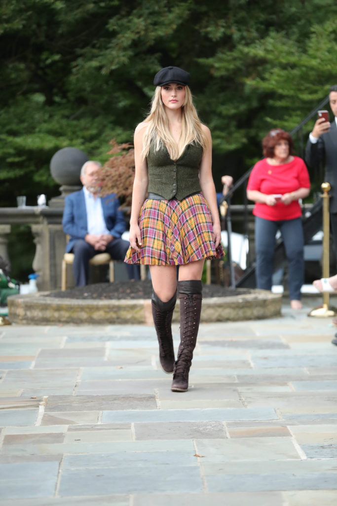 MILL NECK, NEW YORK - JULY 24: A model walks the runway at the Dressed To Kilt Charity Fashion Show at Mill Neck Manor on July 24, 2021 in Mill Neck, New York. (Photo by JP Yim/Getty Images for Dressed to Kilt) (Photo by JP Yim/Getty Images for Dressed to Kilt)